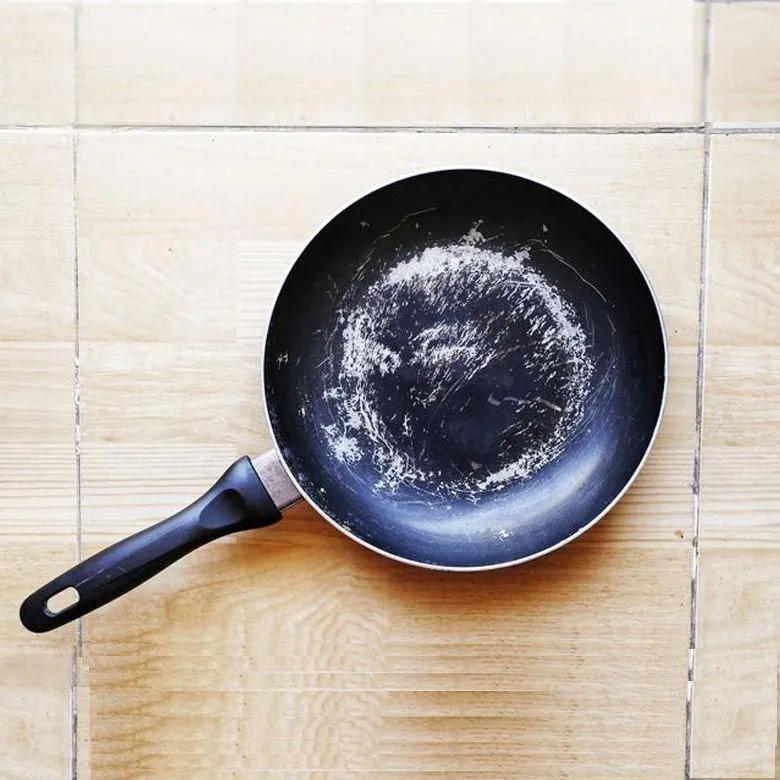 Scratch the Surface: What That Flaking Non-Stick Pan Is Really Putting on Your Plate